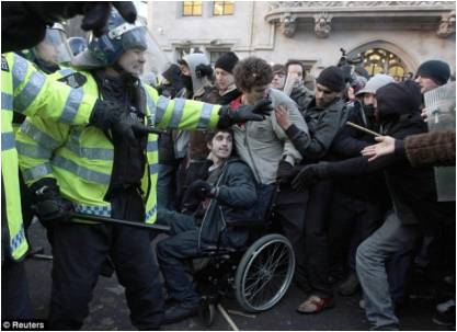 Can-Do-Ability: British Police Attack And Push Over Man In Wheelchair